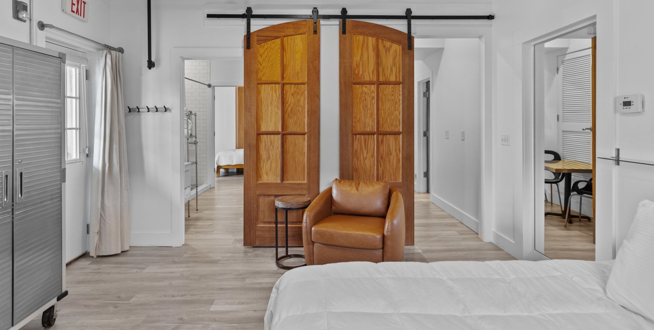 The Sound Suite king bed and sitting area